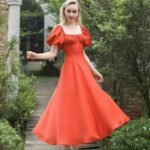 Fiesta - orange puff sleeve midi dress